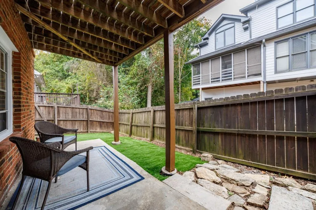 Terrace Level patio and yard with artificial turf