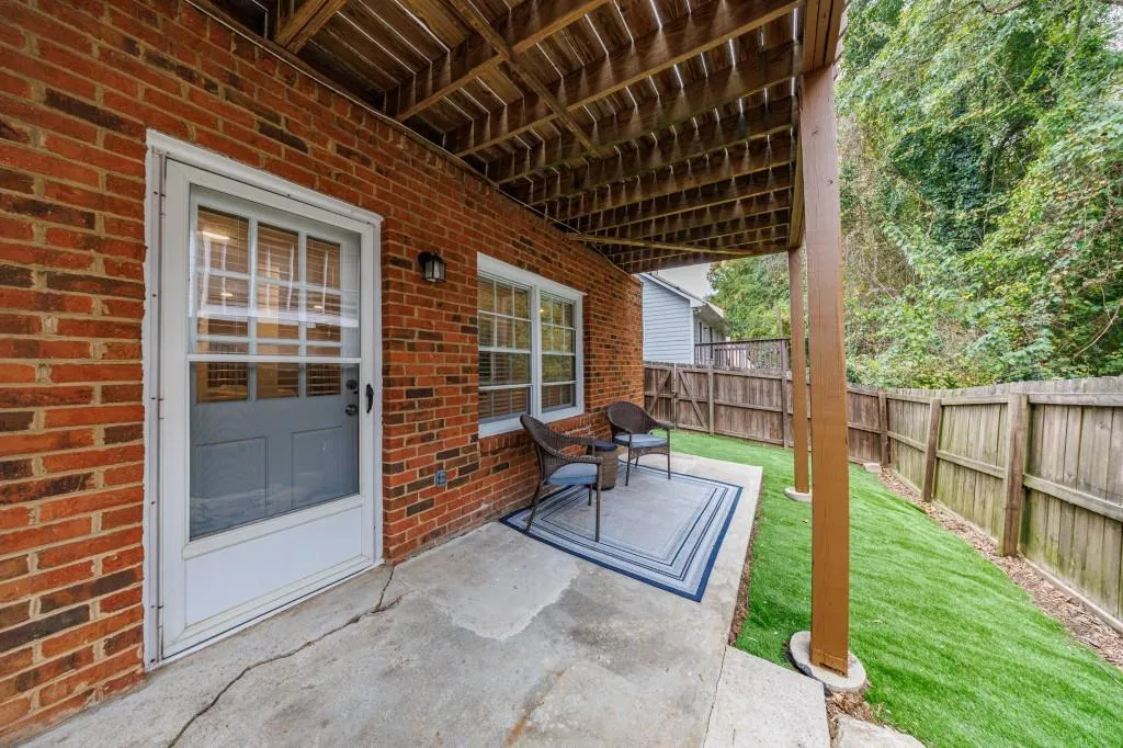 Terrace Level patio and yard with artificial turf