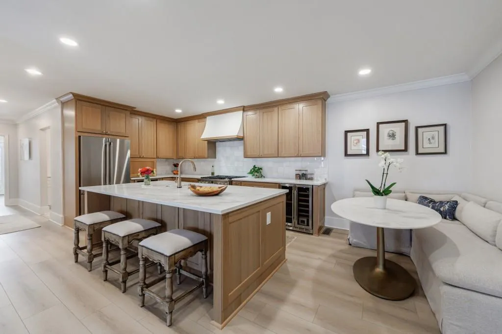 Spacious kitchen with Corian countertops and dining area