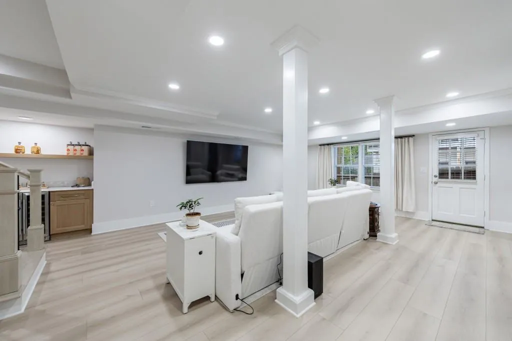 Daylight Terrace Level Great Room with door to Backyard