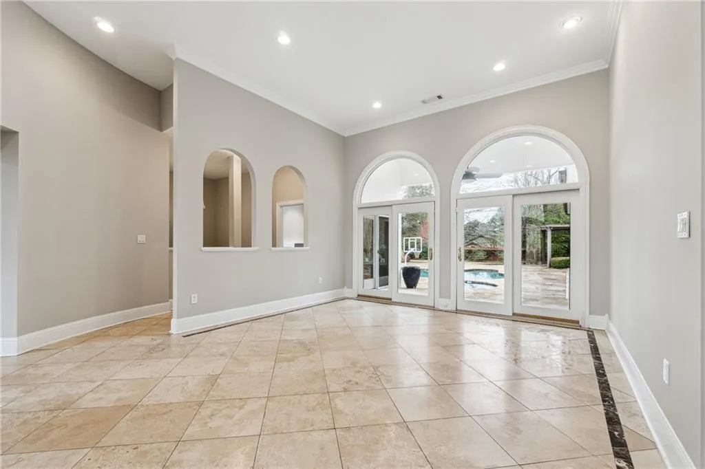 Unfurnished room featuring ornamental molding