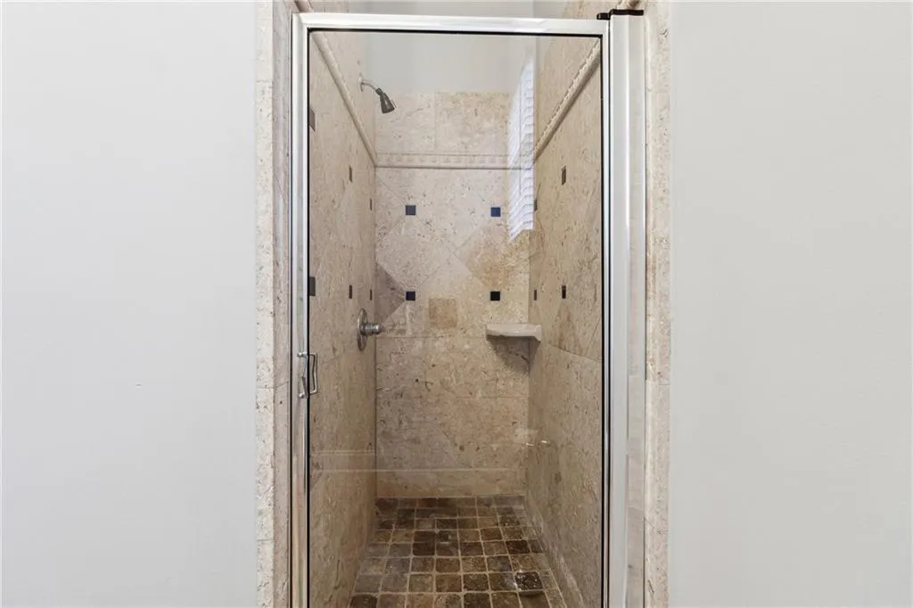 Bathroom featuring an enclosed shower
