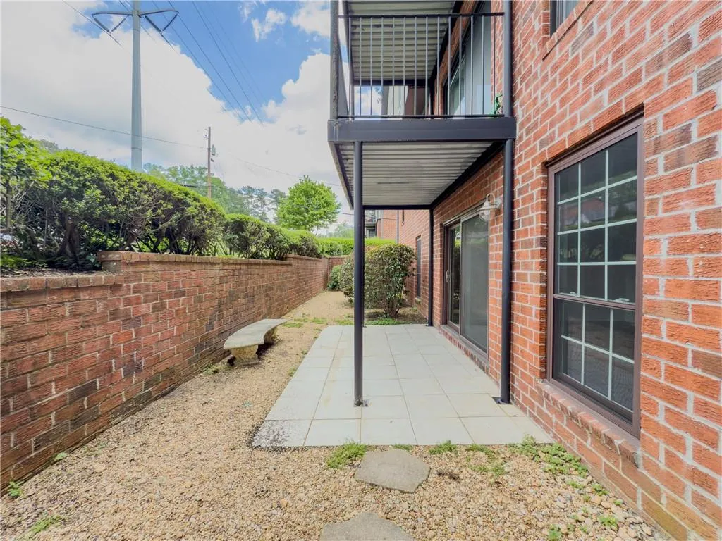 View of patio / terrace featuring a balcony and fence