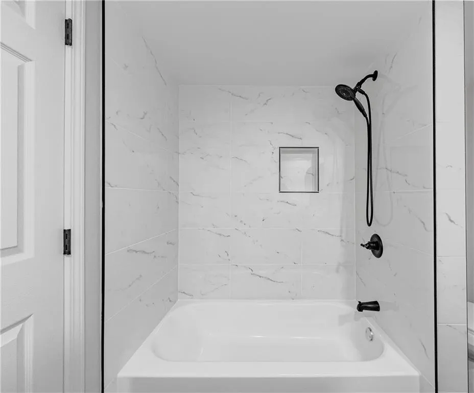 Bathroom featuring  shower combination
