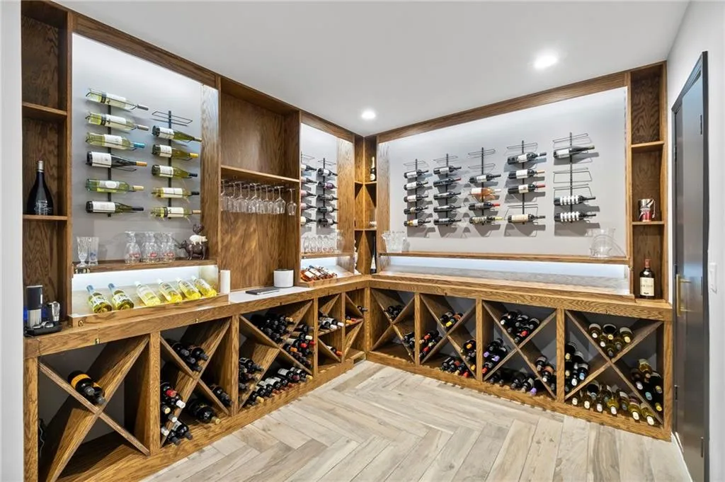 Wine room featuring parquet flooring