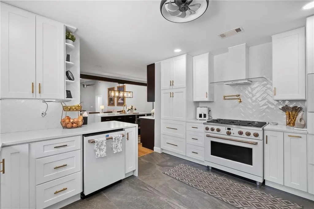 Kitchen featuring white cabinets, a ceiling fan, white appliances, open shelves, and recessed lighting