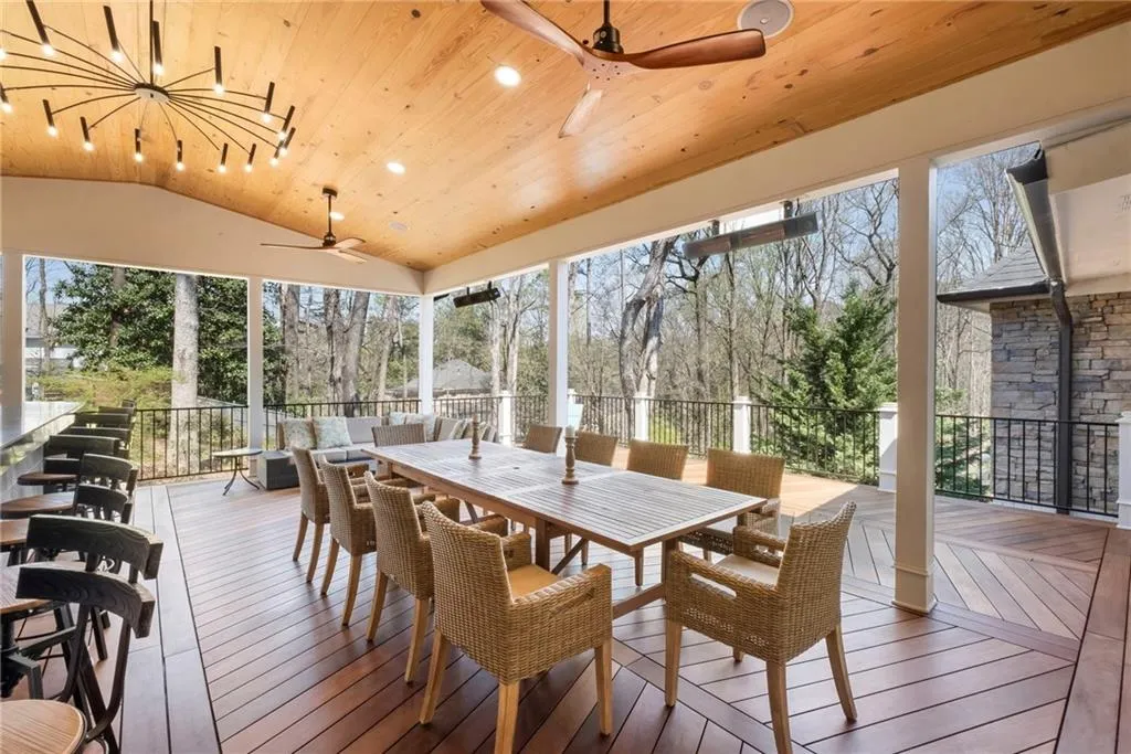 Sunroom featuring recessed lighting, hardwood / wood-style floors, and a vaulted wooden ceiling