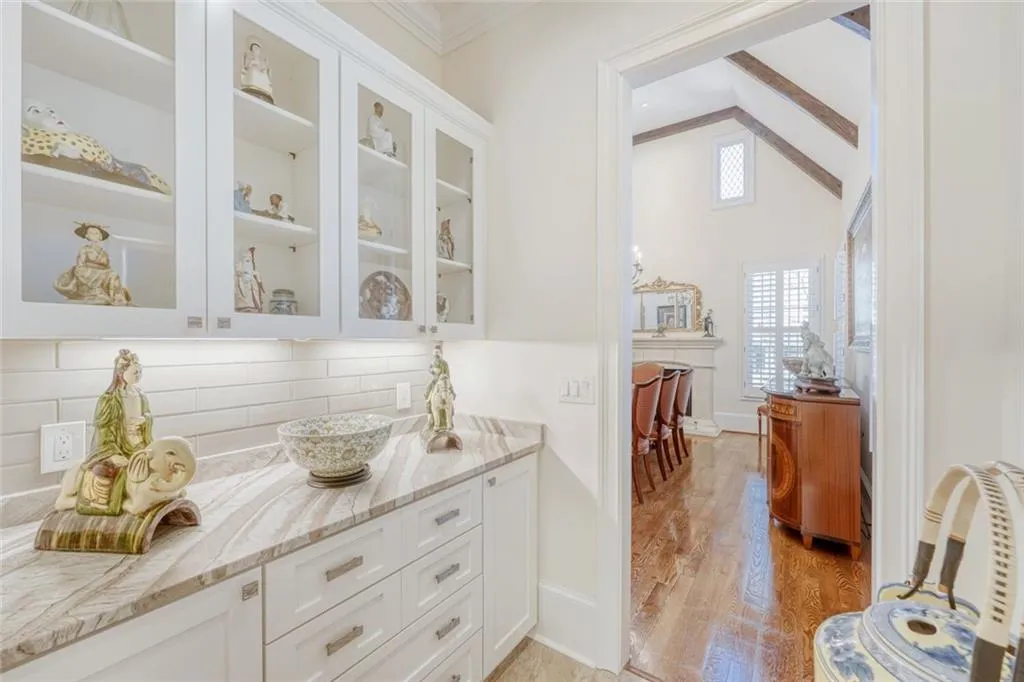 Serving pantry between kitchen and dining rooms.