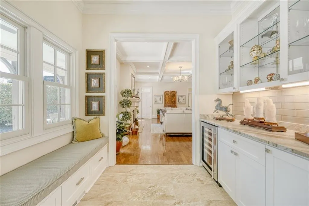 Drink cooler and serving bar off living room.