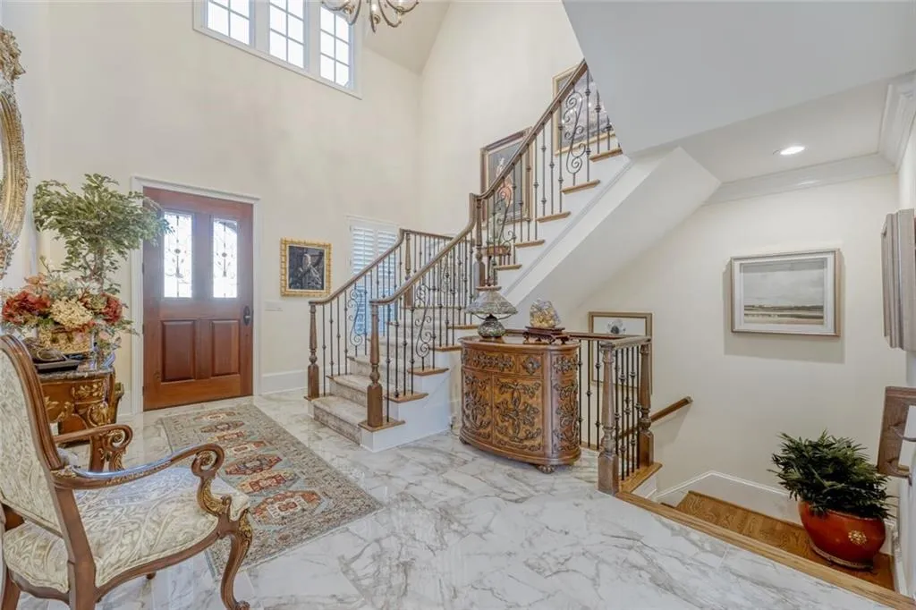 Go upstairs from the main entrance of this home.