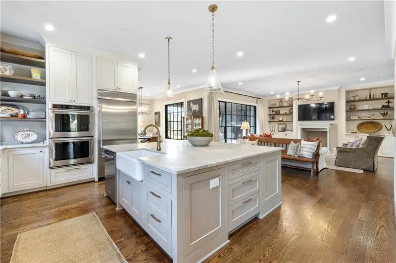 Large island with stone countertop Large island with stone countertop