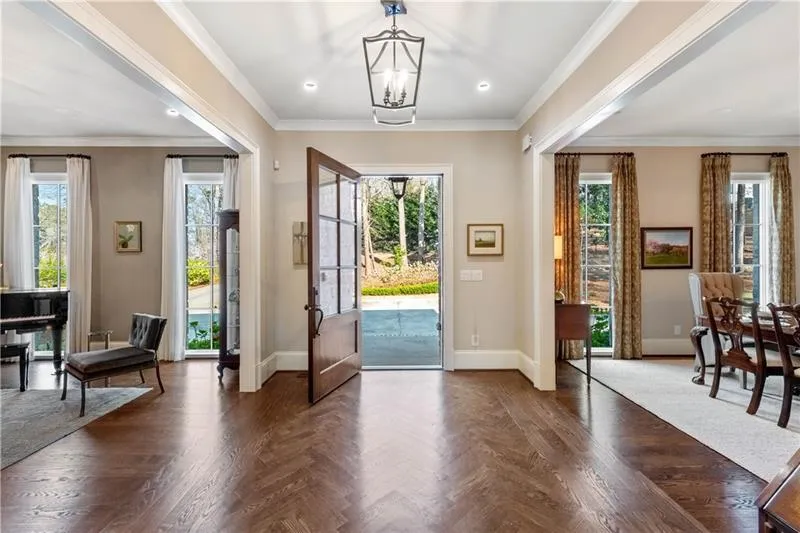 Center Hall flanked by banquet dining and living rooms Center Hall flanked by banquet dining and living rooms