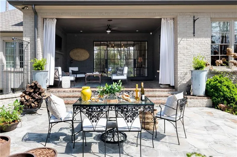 Outdoor living space on expansive stone patio Outdoor living space on expansive stone patio