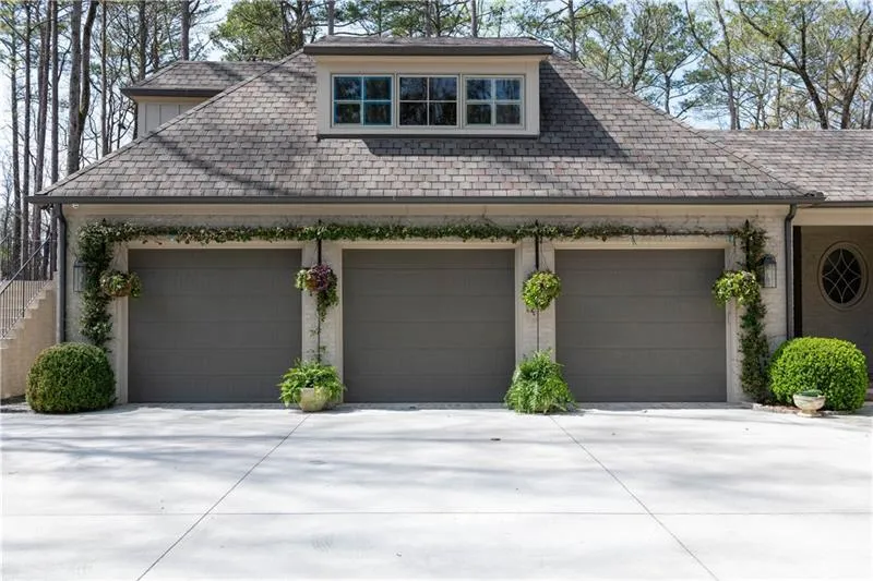 3 Car garage with arbor for blooming seasonal accents 3 Car garage with arbor for blooming seasonal accents