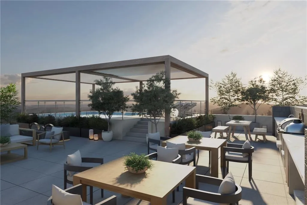 Rooftop Terrace with Heated Plunge Pool, Wine Bar, Summer Kitchen, and Fitness Studio