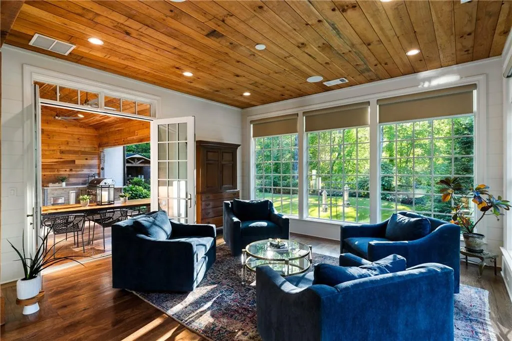 Tranquil sunroom or living room off the covered patio and great room