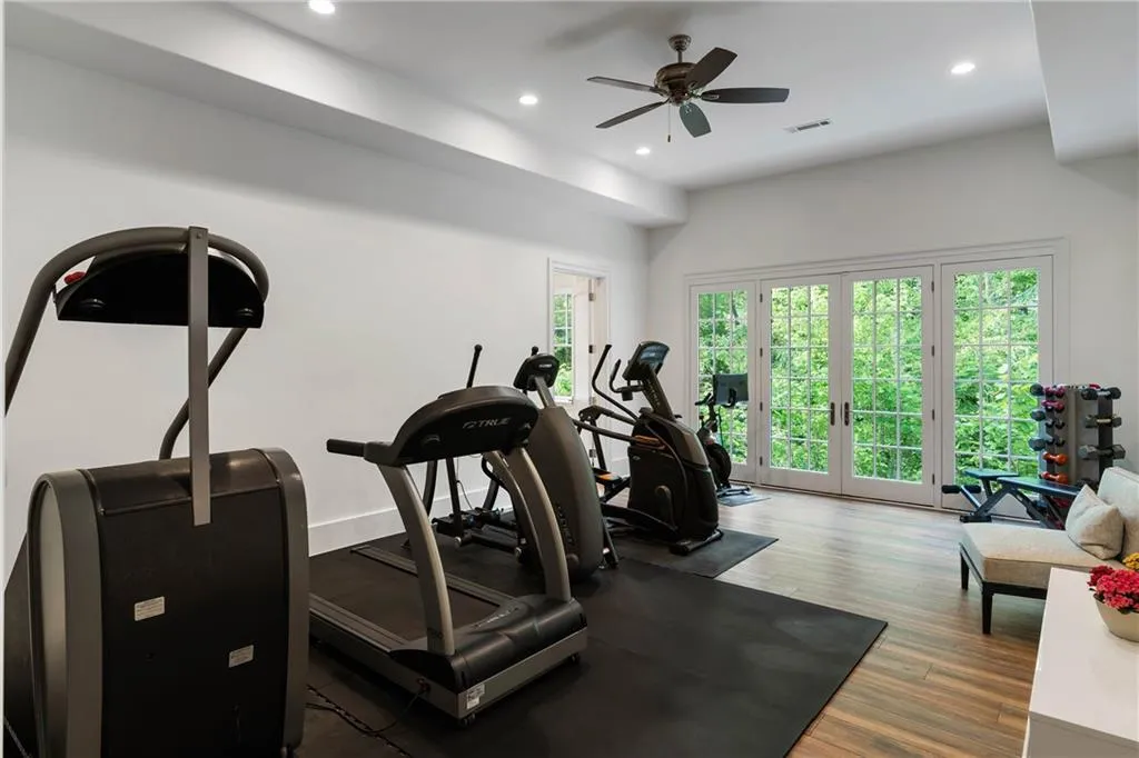 Currently used as an exercise room, this rec space between bedrooms on the terrace level lends for a perfect living space for au-pair or in-law suite