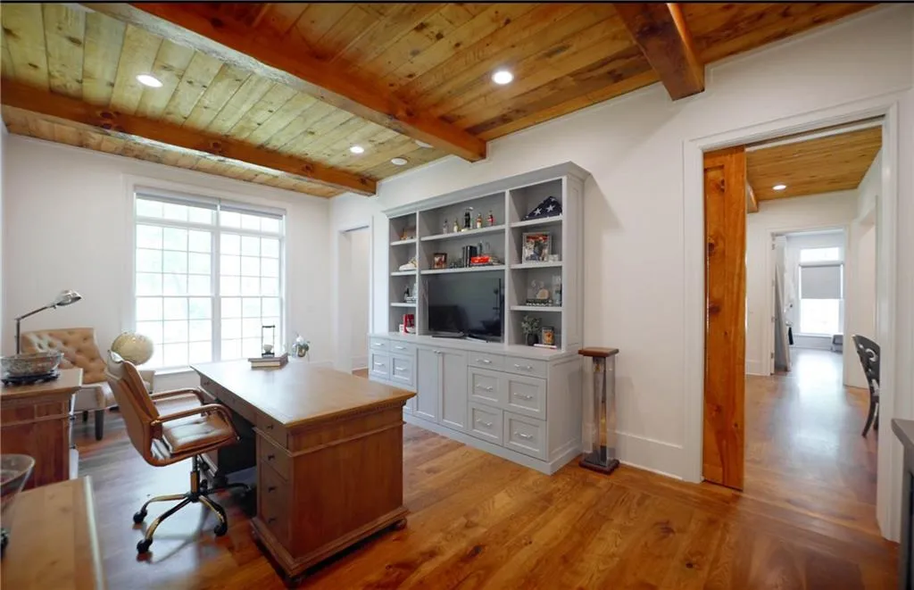 Sitting area, home office or even a nursery off primary bedroom suite with pocket doors