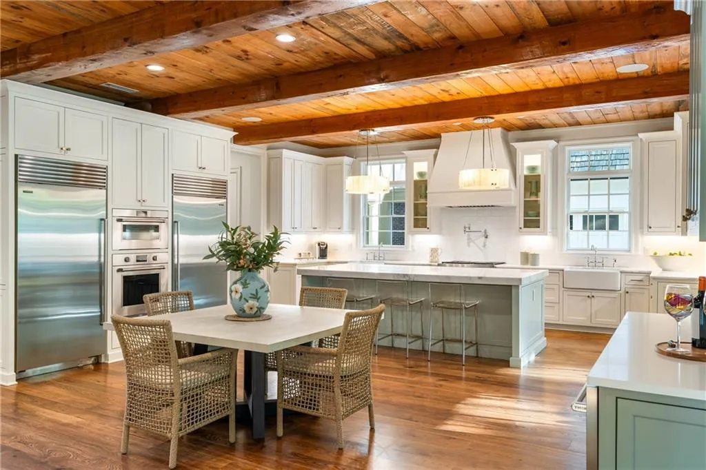 Gourmet kitchen off the great room and dining room for a cohesive living space