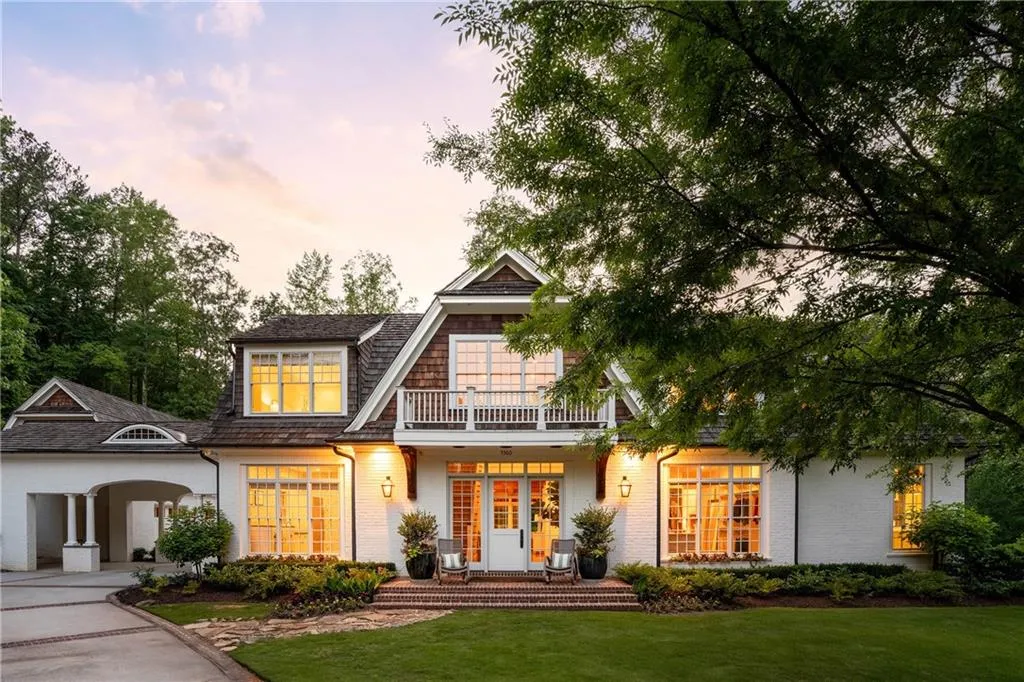 Nestled on over 3 acres in an executive four home community near Chastain Park.
