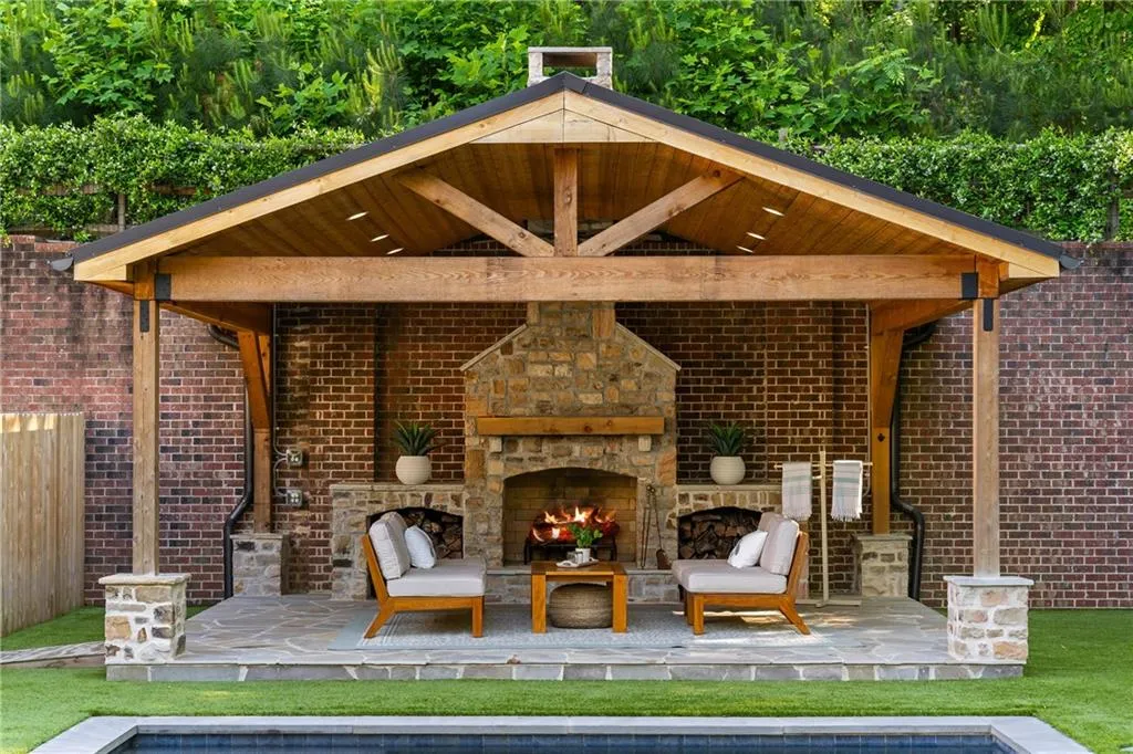 Outdoor pavilion with wood burning fireplace