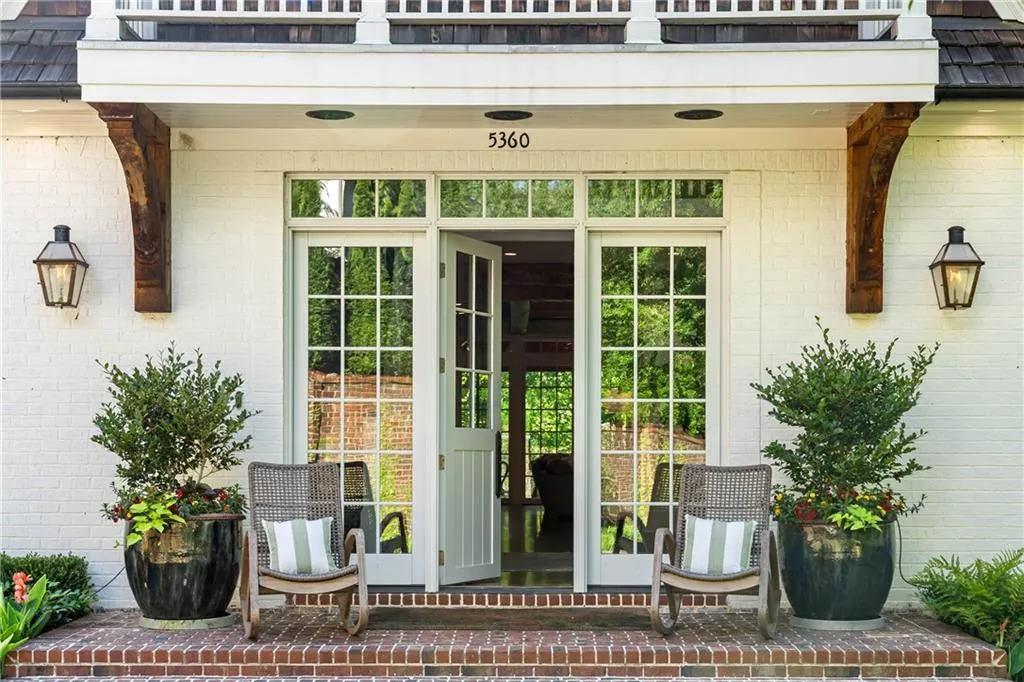 Brick pavers lead to your charming covered front porch and entryway
