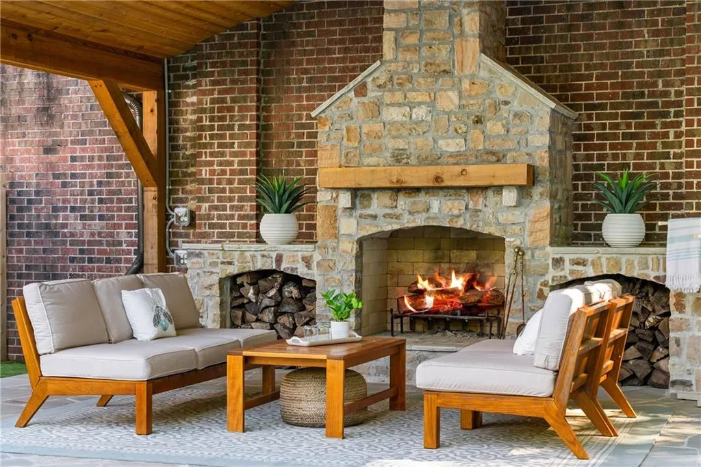 Outdoor wood burning masonry fireplace