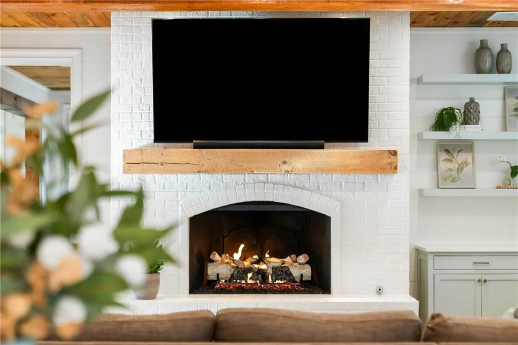 Large gas fireplace with custom mantle