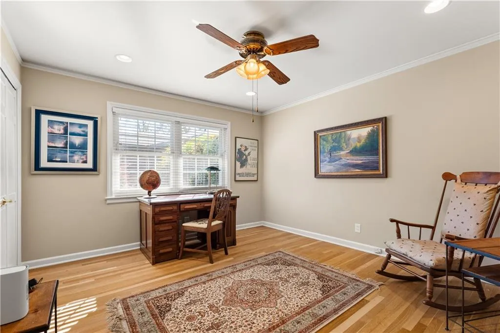 Office featuring ornamental molding, light wood finished floors, ceiling fan, and recessed lighting