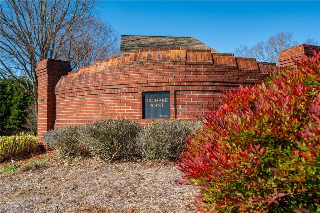 Entrance to this quaint neighborhood with newer homes for the area!