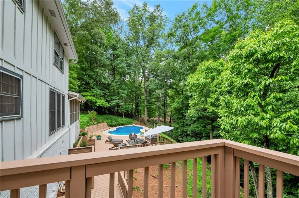 Private master bedroom deck with pool view