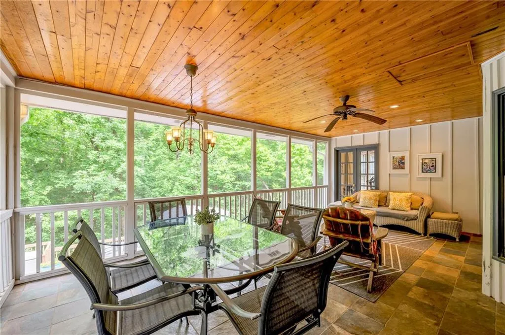 Wall of windows overlooking the pool
