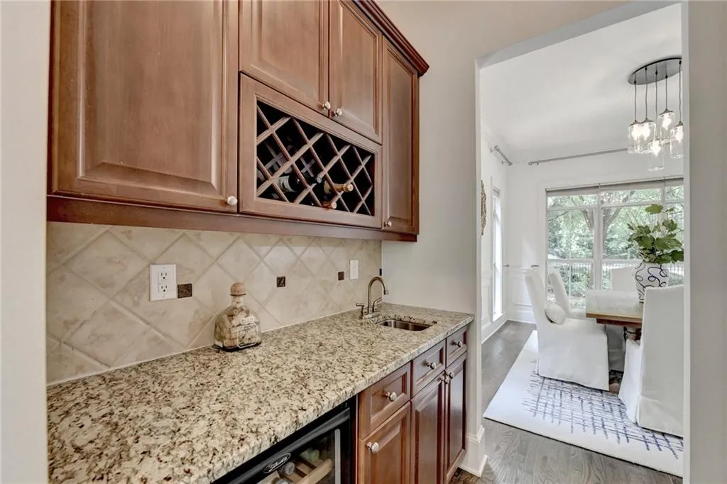 Butler's pantry with mini fridge