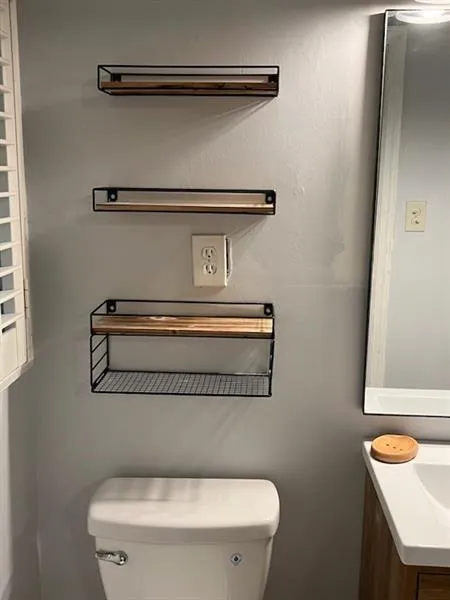 Bathroom with toilet and vanity