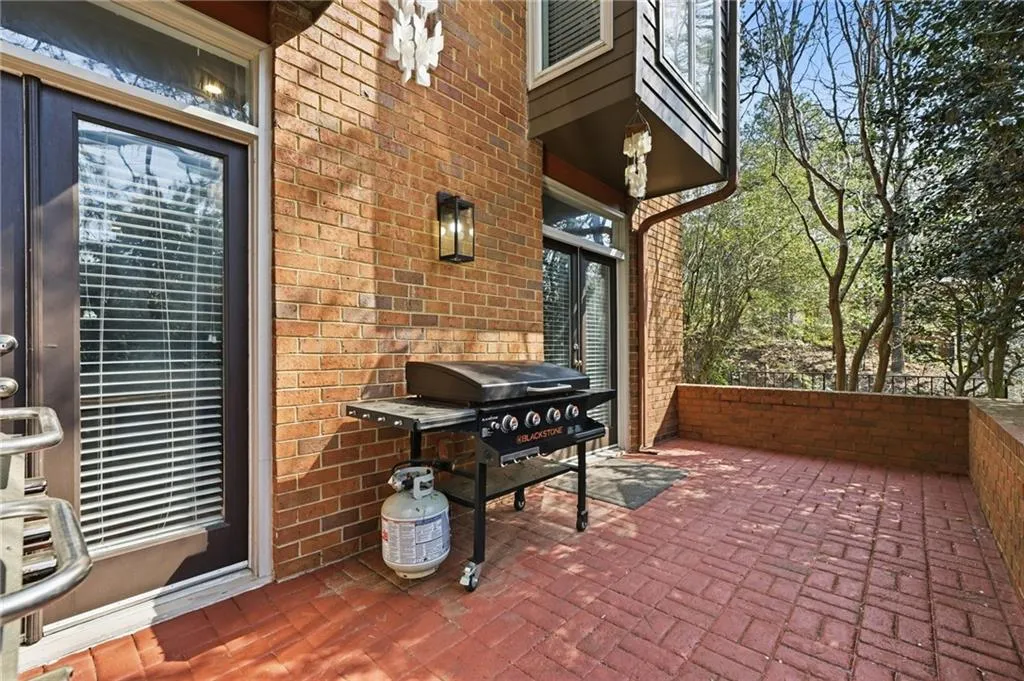 View of patio with area for grilling