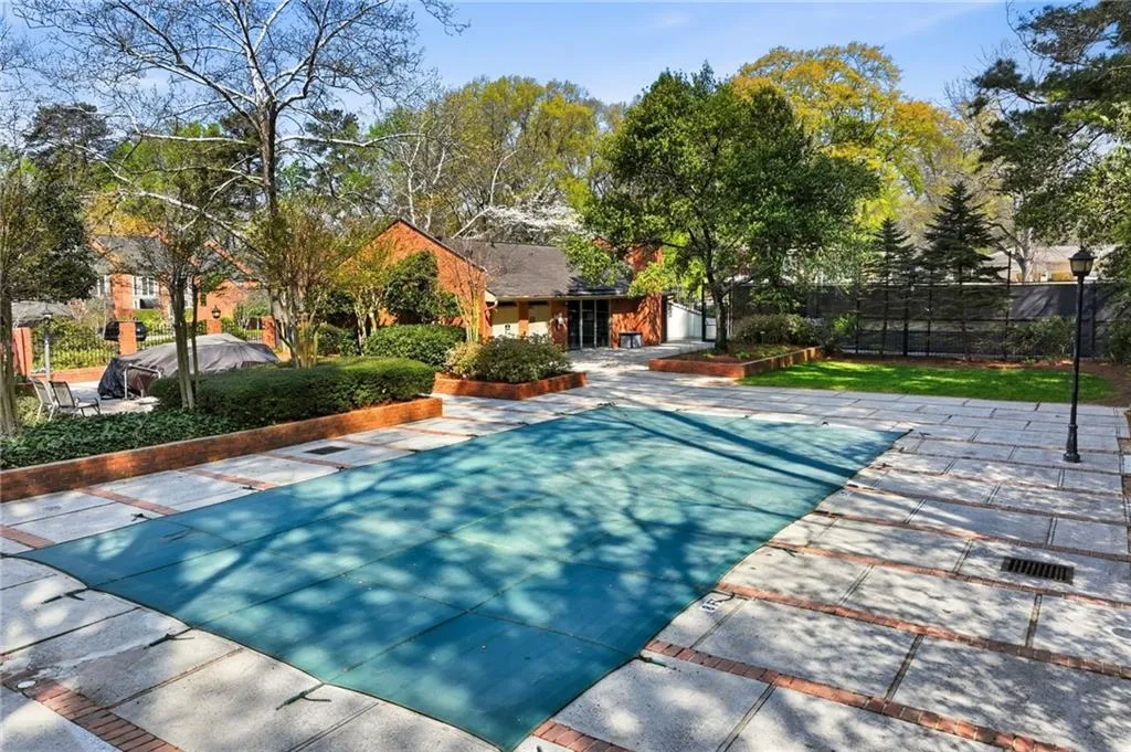 View of pool featuring patio surround