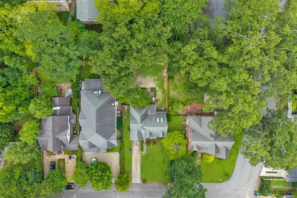 Whether you envision a renovation or a new custom build, the curb appeal and established setting offer endless potential.