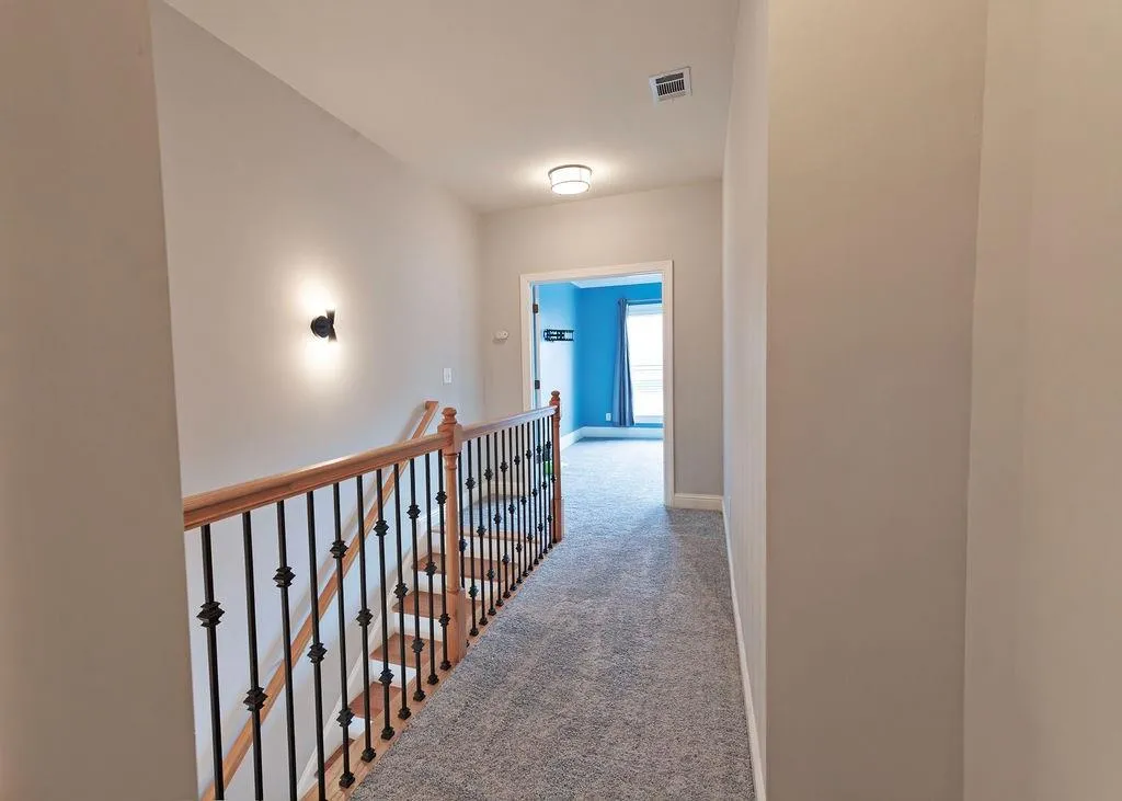 Upper Level Corridor Featuring New Carpets.