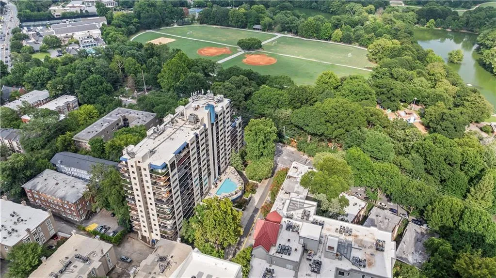 Aerial view of property's location featuring a large body of water