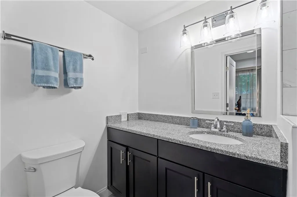 Bathroom featuring toilet and vanity