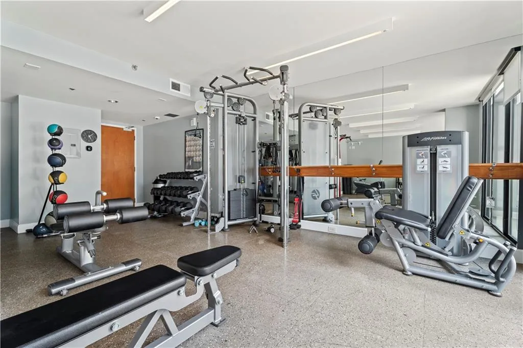 Exercise room featuring baseboards