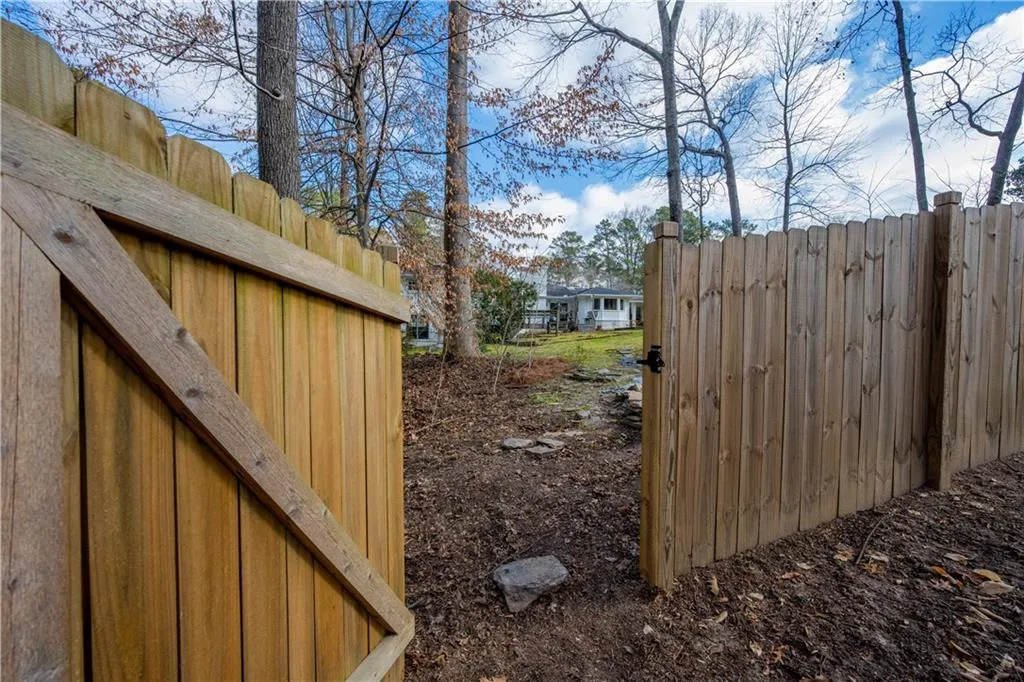 Gate to path to Mark Trail Club