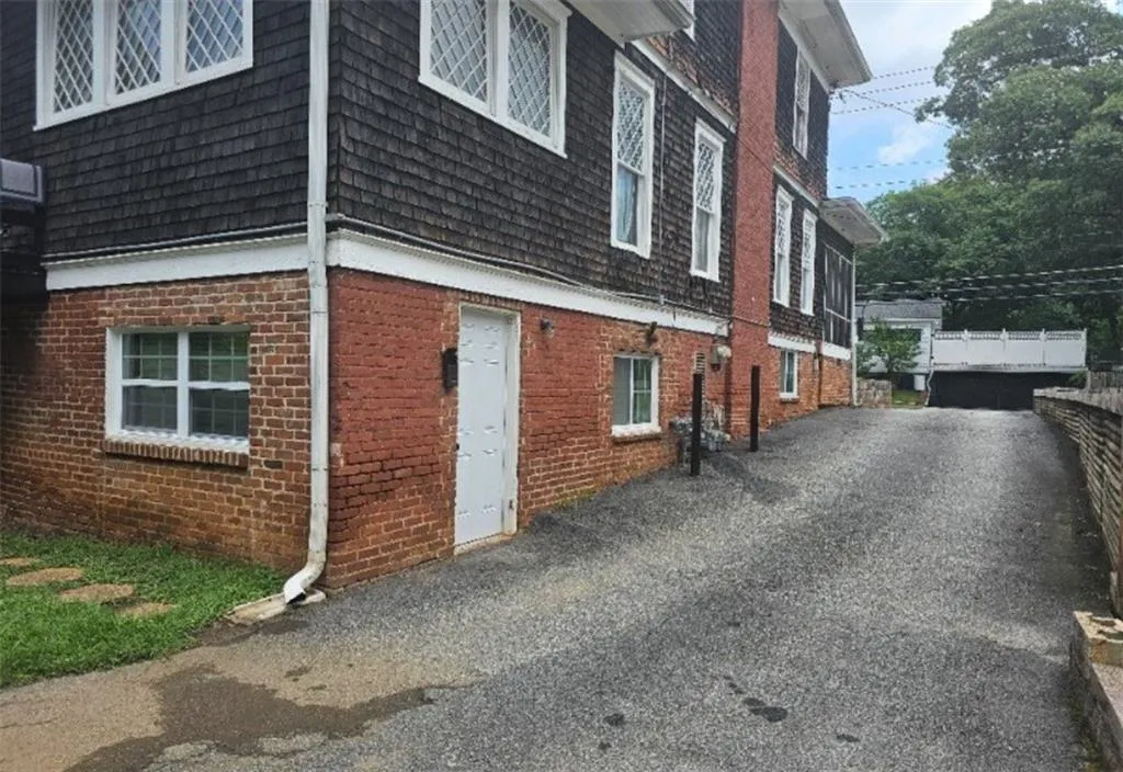 Driveway and second entrance to basement