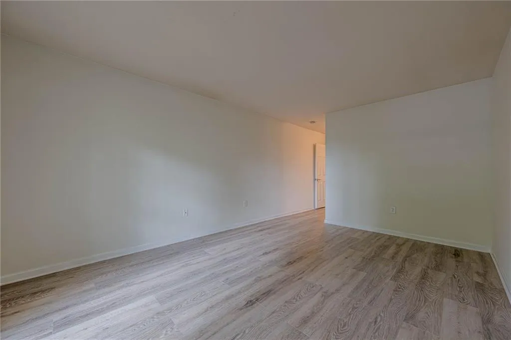 Empty room with light wood-style floors