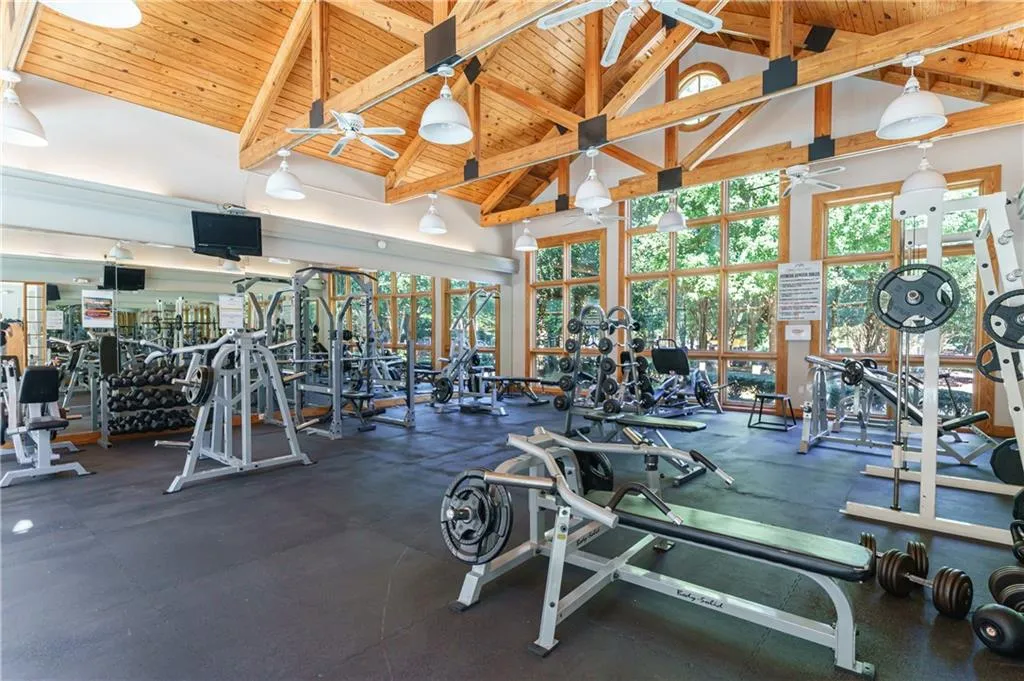 Fitness room with cardio and weighs