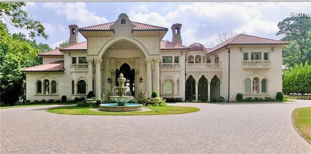 View of front of house featuring a balcony