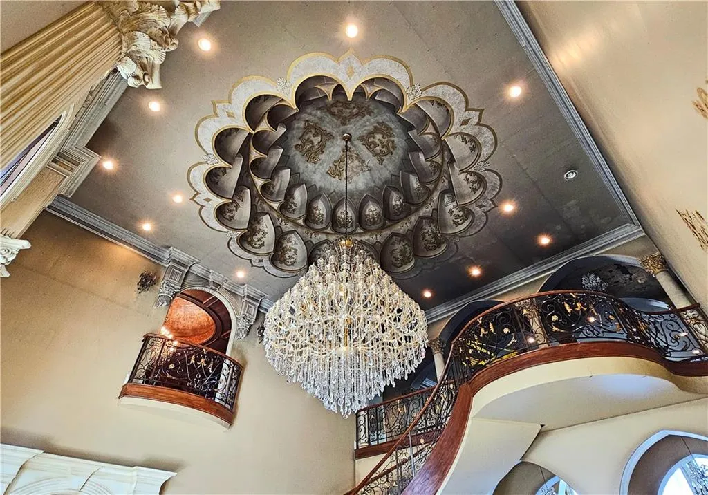 Details with a chandelier and ornamental molding