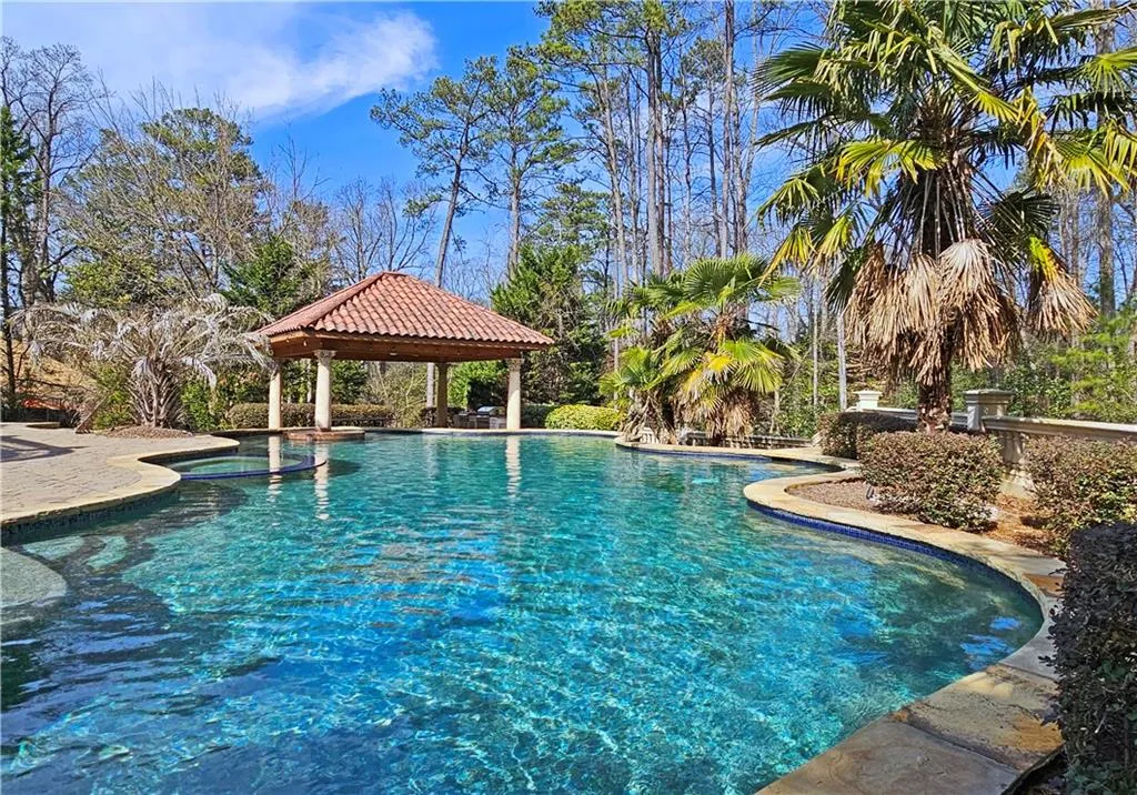 View of swimming pool featuring a gazebo
