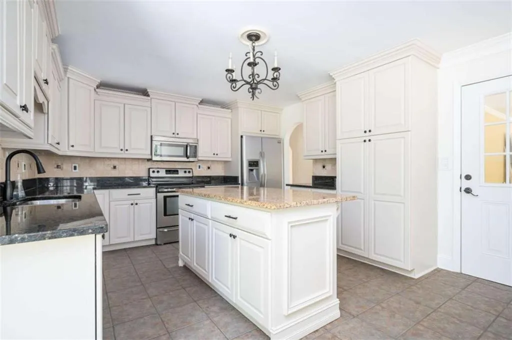 620 Spalding Drive, Sandy Springs, Georgia 30328, 3 Bedrooms Bedrooms, ,2 BathroomsBathrooms,Residential,For Sale,620 Spalding Drive,7743671