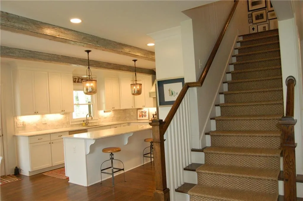 Steps up to primary suite.
